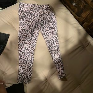 Pockets, pink leopard leggings.